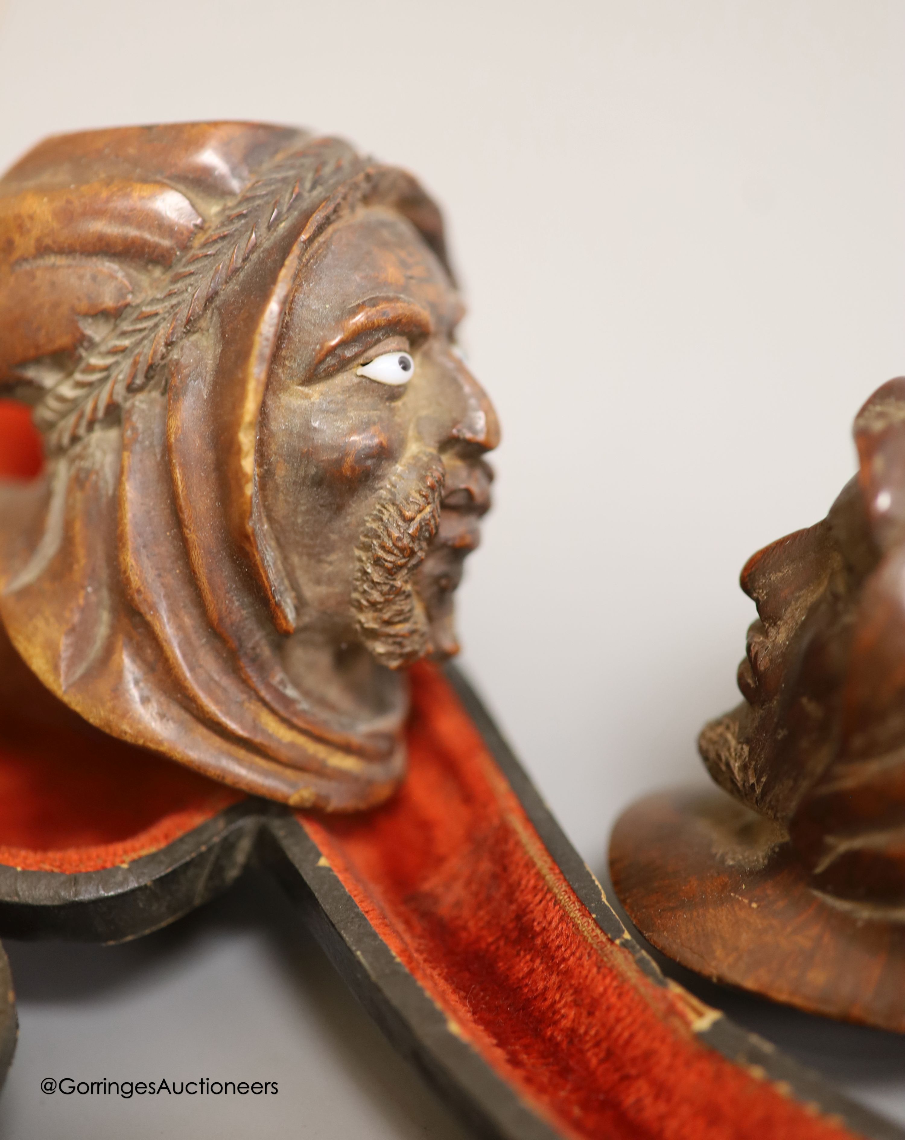 An Inuit stone bear and a collection of Meerschaum pipes